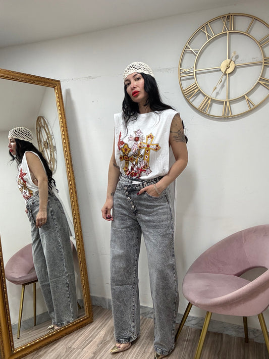 Jeans 6 bottini asimmetrico